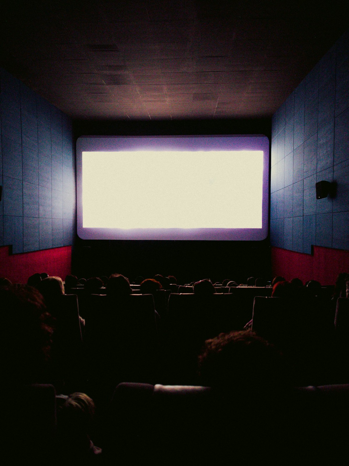 ALR portable projection screen dark cinema room dramatic lighting